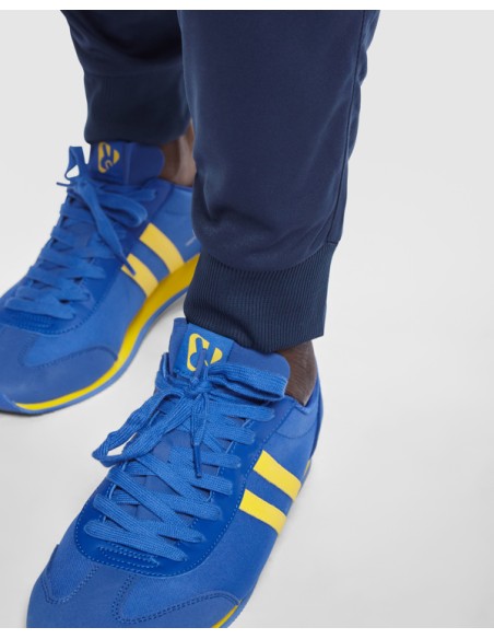 Pantalons llargs xandalls, baixos amb puny i cremallera - ADULT I INFANTIL - ARGOS ROLY