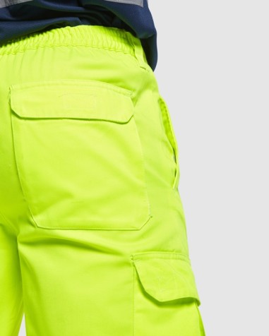 High-visibility work trousers made of... High-visibility work trousers made of...