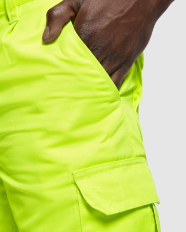 High-visibility work trousers made of... High-visibility work trousers made of...