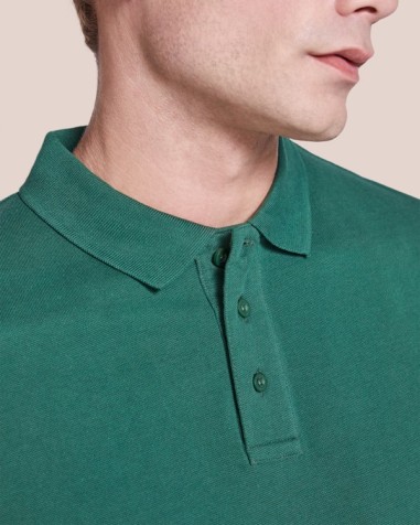 Short-sleeved polo shirt in 100%... Short-sleeved polo shirt in 100%...
