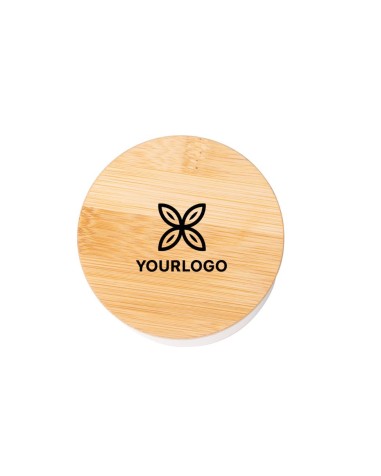 View of the bamboo lid of the aromatic candle made of vegetable wax and presented in a ceramic cup with bamboo details. View of the bamboo lid of the aromatic candle made of vegetable wax and presented in a ceramic cup with bamboo details.