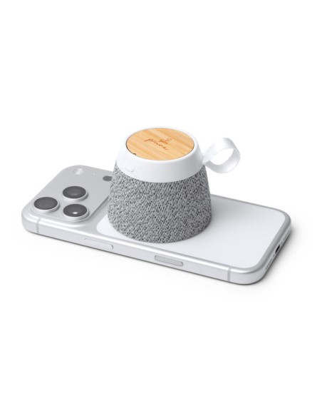 View of the Monark speaker with magnet attached to a mobile phone