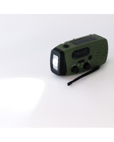 Multifunction radio with external battery, speaker, dynamo and flashlight.